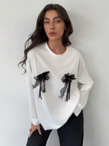 Aloruh Camiseta de manga larga con cuello redondo oversize con lazo decorativo para mujeres, primavera/verano