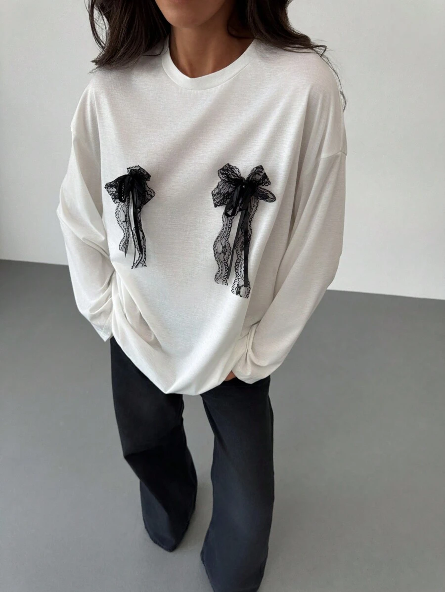 Aloruh Camiseta de manga larga con cuello redondo oversize con lazo decorativo para mujeres, primavera/verano