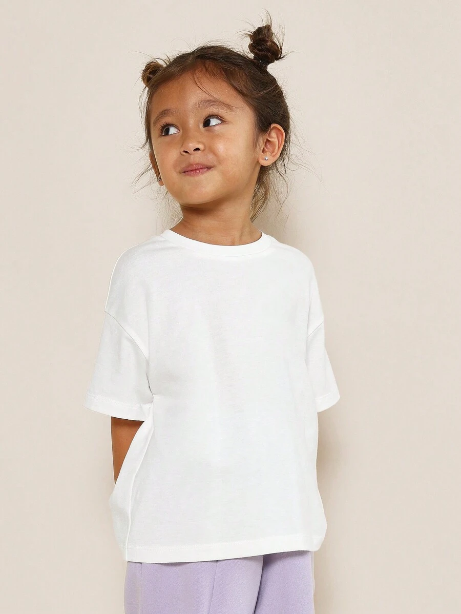 SUMWON Young Girls Everyday Oversized Fit Short Sleeve Essential T-Shirt With Branded Badge For Casual And Vacation - White - View 1