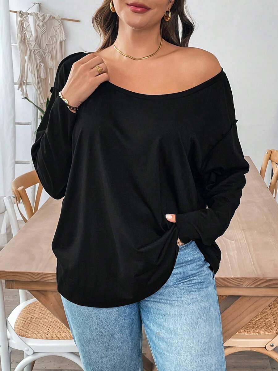 SHEIN Essnce Áo thun đen hở vai dài tay rộng rãi thoải mái mùa thu đông cỡ lớn cho nữ, Áo phông nữ, Trang phục, Trang phục mùa thu, Áo bất đối xứng - màu đen - Xem 1