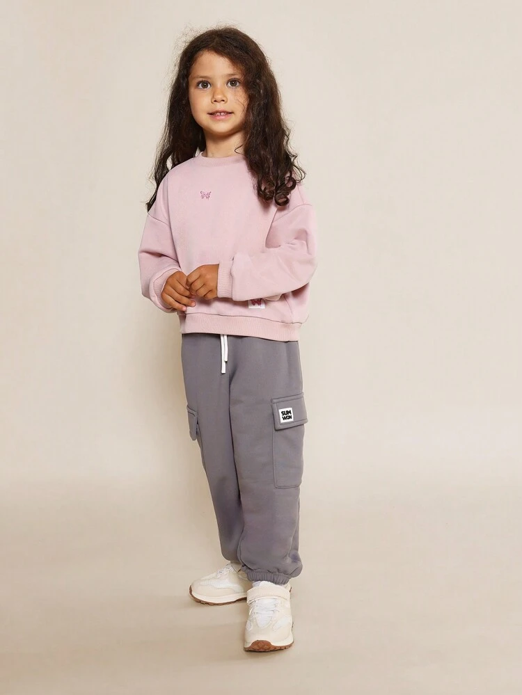 Blusa de gola redonda oversized com bordado de borboleta