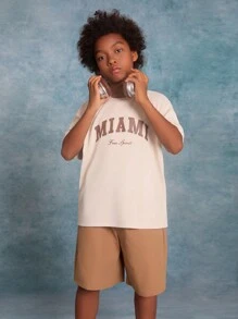 SHEIN Tween Boy Knitted Letter Printed Drop Shoulder Short Sleeve T-Shirt With Slanted Pockets And Drawstring Shorts Set - Camel - View 1