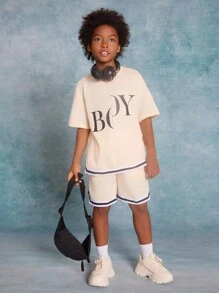 SHEIN Tween Boys' Knitted Solid Color Letter Printed Patchwork Woven Tape Short Sleeve T-Shirt And Shorts Set - Beige - View 6