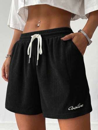 Coolane Short en flanelle d'été noir avec broderie, pour femme, style sport
