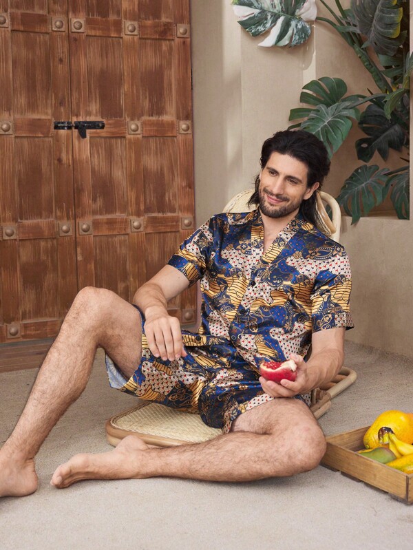 Manfinity ChillVibe Men's All-Over Print Single-Breasted V-Neck Short Sleeve Top And Shorts Sleepwear Set