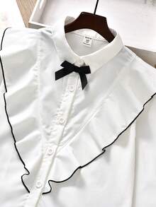 SHEIN Tween Girls Formalne dojazdy do pracy, elegancka bluzka w stylu pałacowym z białą koronkową kokardką i długim rękawem