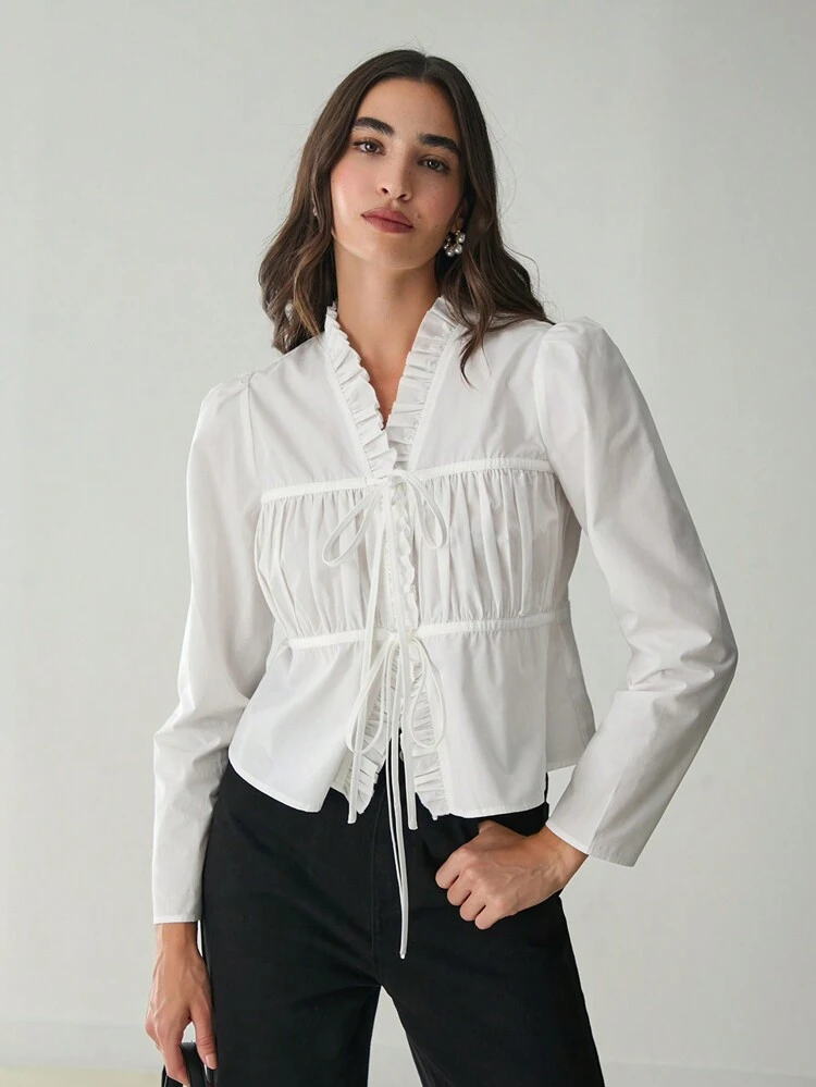 Blouse élégante à manches longues et lien devant de couleur unie avec bordure à volants, printemps/été