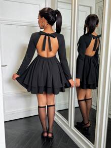 VaVaBold Solid Color Round Neck Long Sleeve Backless Ruffled Hem Casual Vacation Dress