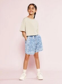 SUMWON Camiseta de niña preadolescente con hombros caídos, ajuste recortado, lavada, con estampado gráfico de graffiti y ángel