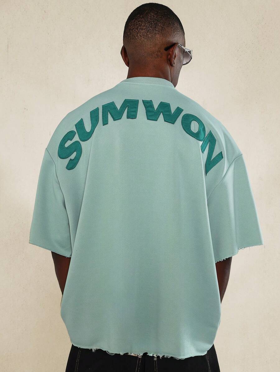 SUMWON Áo thun oversize vừa vặn Raw Edge có túi trước và miếng dán ở tay áo - màu xanh lá - Xem 1