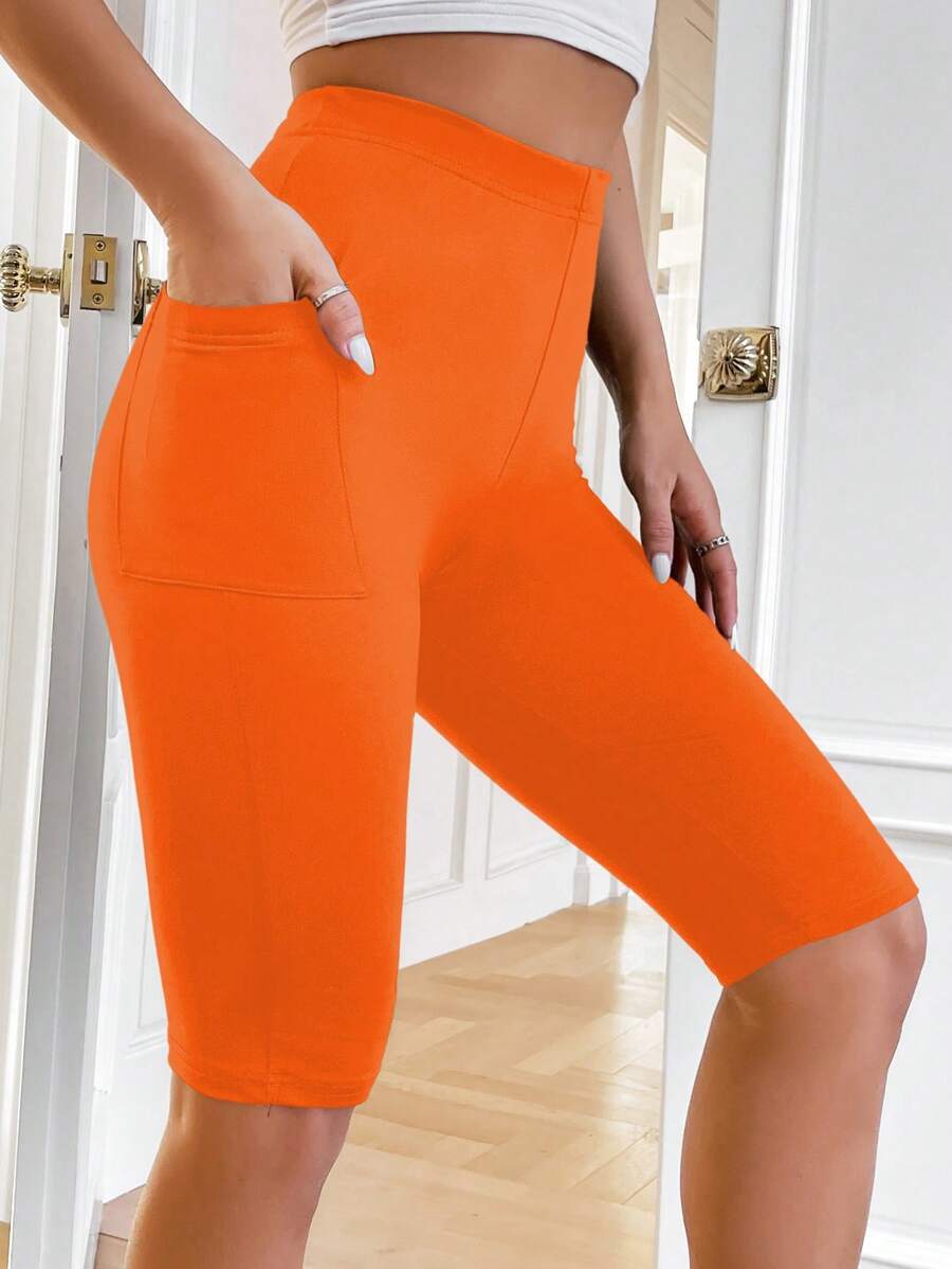 Chiquease Quần legging lửng cạp cao màu trơn có túi bên hông - trái cam - Xem 1