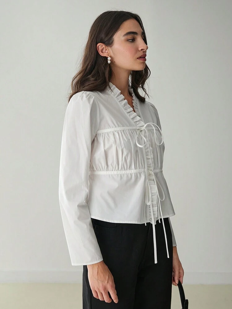 Blouse élégante à manches longues et lien devant de couleur unie avec bordure à volants, printemps/été