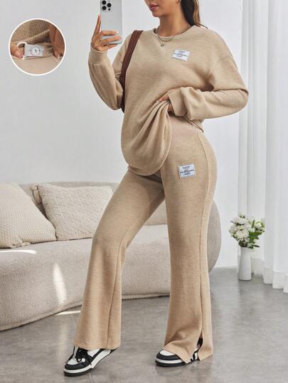 SHEIN Conjunto de 2 piezas de parte superior de manga larga holgada con parche de letra y pantalones acampanados para maternidad y adolescentes