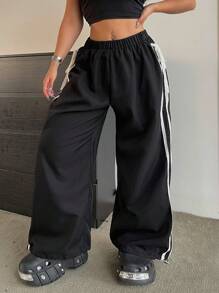 Flirla Quần Jogger cạp co giãn sọc cỡ lớn có đường xẻ bên hông và viền dây rút - màu đen - Xem 4