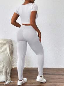 SHEIN Conjunto de dos piezas de top corto acanalado con escote en pico y leggings ajustados, para primavera/verano