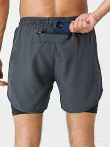 Manfinity Sport Corelite Manfinity Fitness 男友风格男士抽绳腰 2 合 1 运动弹力短裤，配有手机口袋 健身短裤 男友风格男士短裤 男友风格男士篮球短裤 洗手液 校园灰色短裤 - 深灰色 - 查看 2