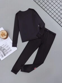 Bộ đồ ngủ 2 món cho bé trai - Áo dài tay in hình khủng long phát sáng trong bóng tối vừa vặn và quần dài, dành cho bé lớn - màu đen - Xem 2