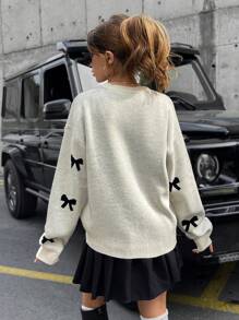 SHEIN Tall Maglione in maglia casual ampio con collo rotondo, maniche a giro e decorazione a fiocco per donna