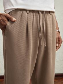 AKNOTIC Business Casual 男式针织松紧腰中腰直筒休闲裤 - 金属点缀，卡其色带字母