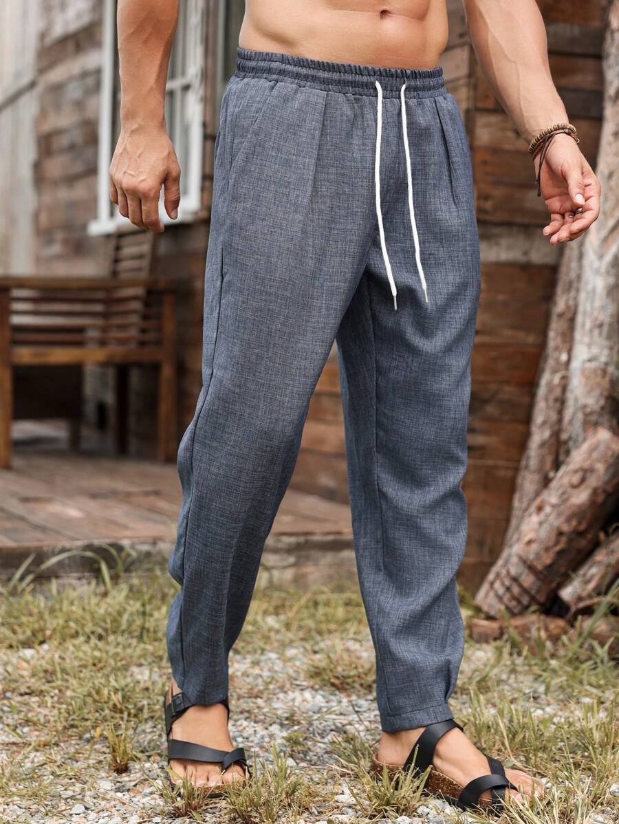 Manfinity Homme Quần dài thường ngày có túi rút dây màu trơn cho nam - Màu xanh bụi bặm - Xem 1