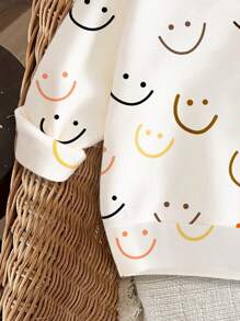 SHEIN Mode-Lässig-Tragen Baby Mädchen Niedlich Cartoon Lächelndes Gesicht Muster Weiß Gestrickt Weich Locker Rundhals Hoodie, Geeignet für Herbst/Winter