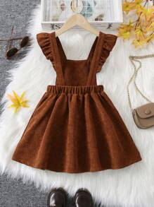 Young Girl Brown Strap Dress, Made Of Classic Corduroy Fabric, Stylish And Warm. The Strap And Ruffle Design Add Sweetness, Suitable For Casual Daily Wear And Outdoor Activities, Fit For Autumn/Winter Season