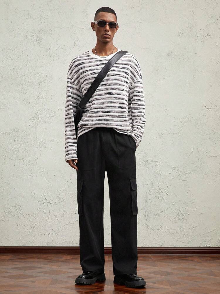 Pantaloni cargo jogger neri lavorati a maglia da uomo, vestibilità slim, casual, con vita elastica e gamba dritta, adatti per uso quotidiano