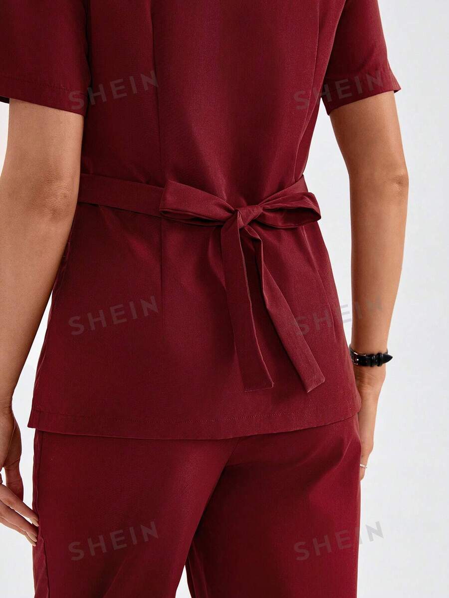SHEIN TaskFit Solid Red Color VNeck Wrap Scrub Top With Pockets And