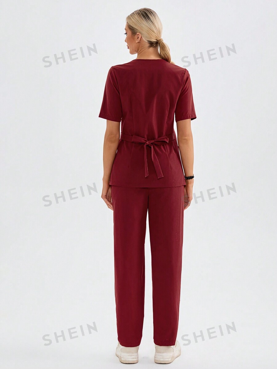 SHEIN TaskFit Solid Red Color VNeck Wrap Scrub Top With Pockets And