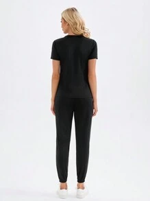 TaskEZ 2 piezas Conjunto de uniforme con parte superior y pantalones de color liso - Negro - Ver 2