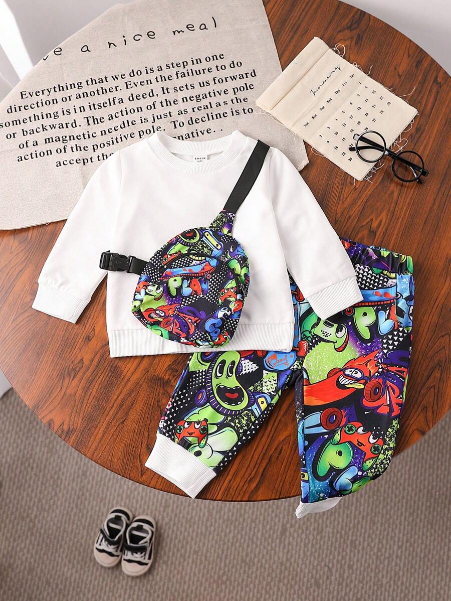 3 Stücke/Set Baby Jungen Streetwear Outfit mit Buchstaben Graffiti Muster Jogginghose, weißem Rundhals Sweatshirt und bedrucktem Rucksack, passend für Herbst und alle Jahreszeiten sowie Fotoshootings
