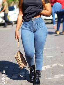 大码女式高腰口袋紧身弹力牛仔裤，秋季休闲日常百搭风格