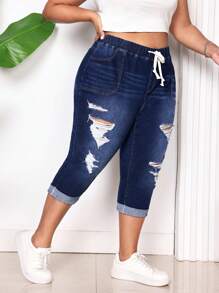 SHEIN CURVE+ Pantalones vaqueros elásticos pitillo azul desgastados de talla grande para mujer
