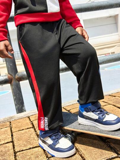 SHEIN 年轻男孩休闲字母印花撞色宽松运动运动裤，带松紧腰带和脚踝