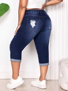 SHEIN CURVE+ Pantalones vaqueros elásticos pitillo azul desgastados de talla grande para mujer
