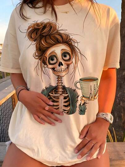 INAWLY Camiseta de mujer de ajuste holgado y casual con estampado de calavera, cuello redondo y manga de hombro caído, camiseta de verano, ropa de Halloween, camisetas gráficas para mujeres