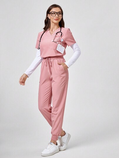 TaskEZ Conjunto de uniforme de enfermera con blusa de manga corta de cuello en V y bolsillo sencillo, y pantalones con nudo delantero