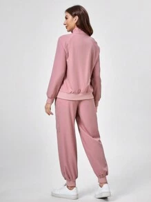 TaskEZ 2 stuks effen kleur split voor rits lange mouw minimalistische top en broek uniform scrub set