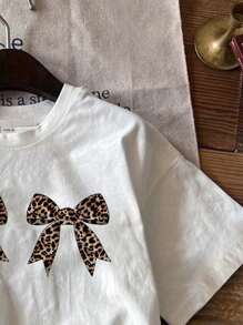 SHEIN EZwear Plus Size Bowknot Design Round Neck Short Sleeve T-Shirt, Casual And Simple Style,Slightly Sheer Summer Suitable For Going Out Leopard Print