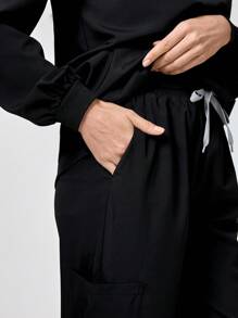 TaskEZ Bộ đồng phục y tá gồm 2 món: Áo dài tay có nút trang trí và quần - màu đen - Xem 7