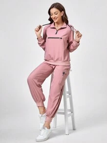 TaskEZ 2 stuks effen kleur split voor rits lange mouw minimalistische top en broek uniform scrub set
