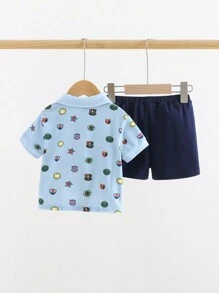 Cozy Pixies 2 piezas/Conjunto Camisa polo de punto de cuello suave con logo de dibujos animados y pantalones cortos de unicolor para niño bebé