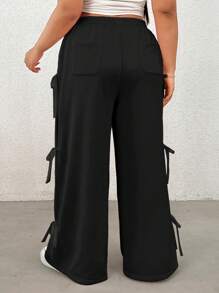 SHEIN EZwear Pantalón de chándal holgado de talla grande con lazo negro vintage