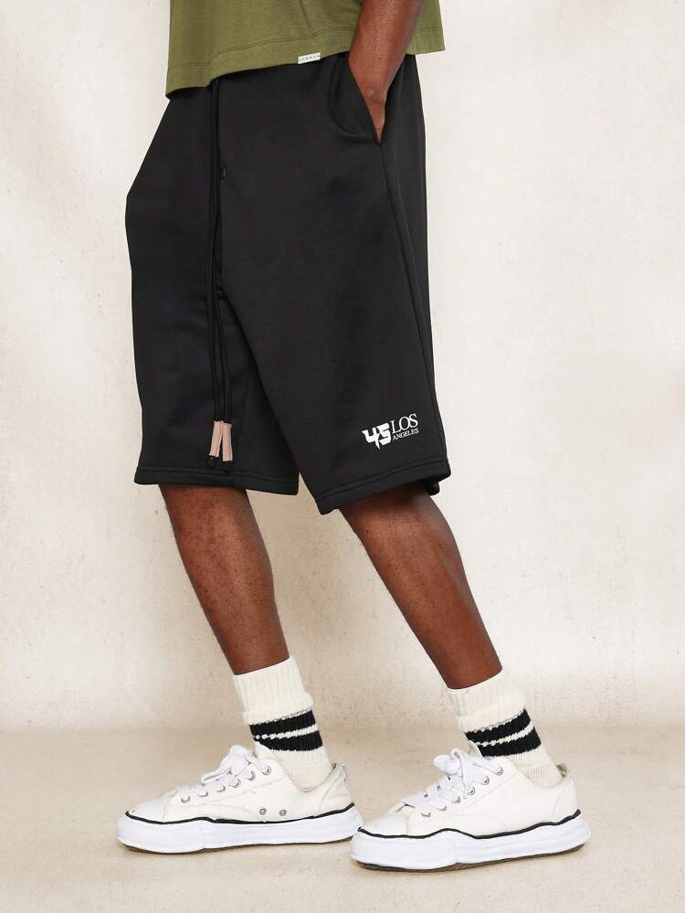 Conjunto de 2 piezas con camiseta ajustada corta con estampado gráfico árabe y pantalón corto plisado