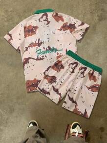 Manfinity EMRG Conjunto de manga corta y pantalón corto con estampado sencillo para hombre de talla grande