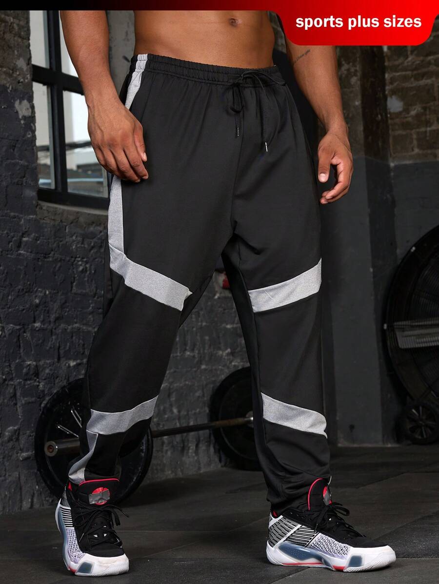 Manfinity Fitness Pantaloni sport cu imprimeuri minimaliste pentru bărbați, mărimi Plus