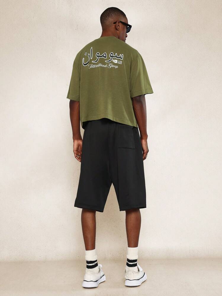 Conjunto de 2 piezas con camiseta ajustada corta con estampado gráfico árabe y pantalón corto plisado