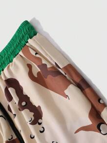 Manfinity EMRG Conjunto de manga corta y pantalón corto con estampado sencillo para hombre de talla grande