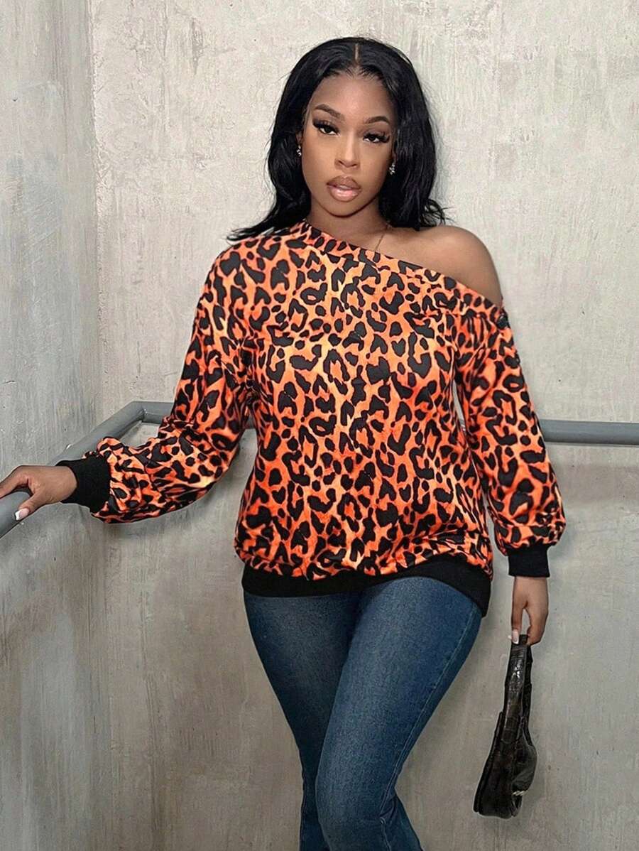 Zolique Women's Loose Fit Asymmetrical Neck Animal Print Sweatshirt With Buttoned Sleeves Design Pullover Fall Sweatshirt - Multicolor - View 1