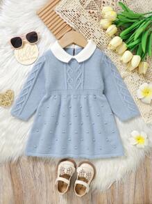 SHEIN 女婴优雅婴儿毛衣裙，彼得潘领设计，甜美迷人，长袖保暖舒适。正面采用精致的心形提花针织，展现工艺。俏皮的波尔卡圆点下摆增添俏皮感，让您的小宝贝成为冬季时尚亮点